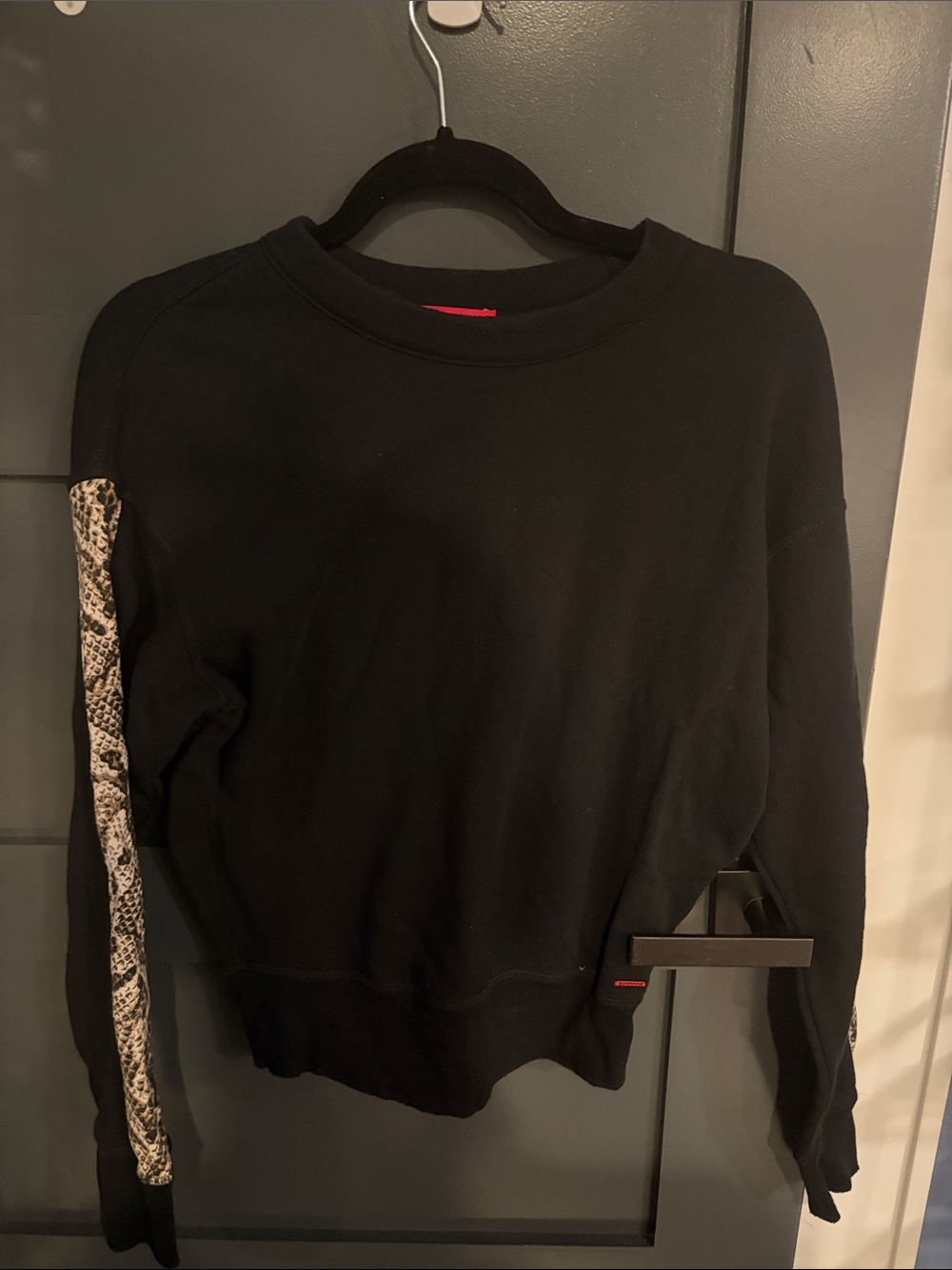 n:PHILANTHROPY Black Crewneck Sweater with Snake-Print Sleeve Stripe
